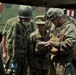 U.S. Marines and Japanese soldiers exchange humanitarian assistance/disaster relief capabilities in Okinawa