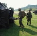 U.S. Marines and Japanese soldiers exchange humanitarian assistance/disaster relief capabilities in Okinawa