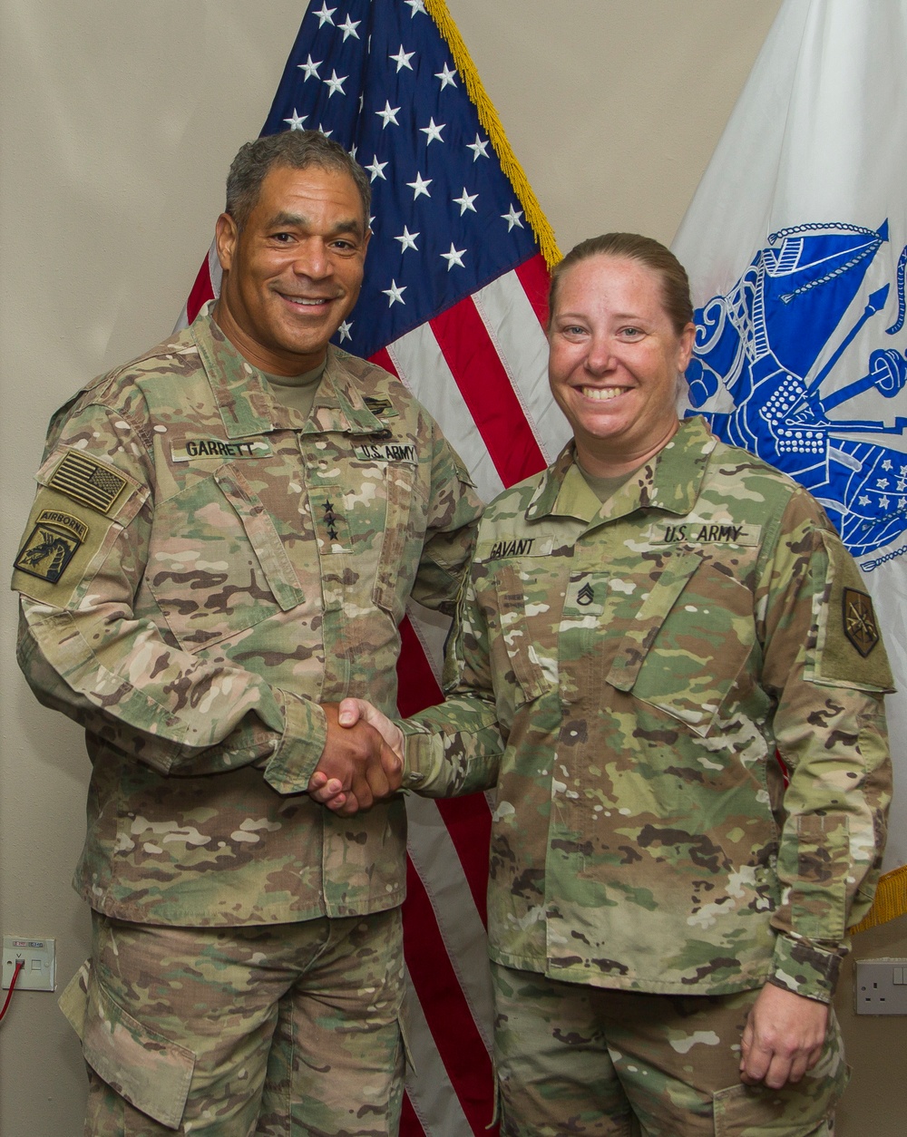 USARCENT commander presents coin to hero of the week