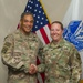 USARCENT commander presents coin to hero of the week