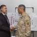 USARCENT commander presents engineer with coin