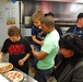 Military Families enjoy pizza, entertainment
