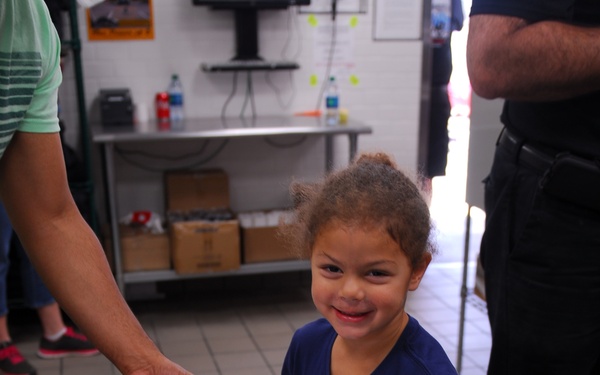 MILITARY Families enjoy pizza, entertainment