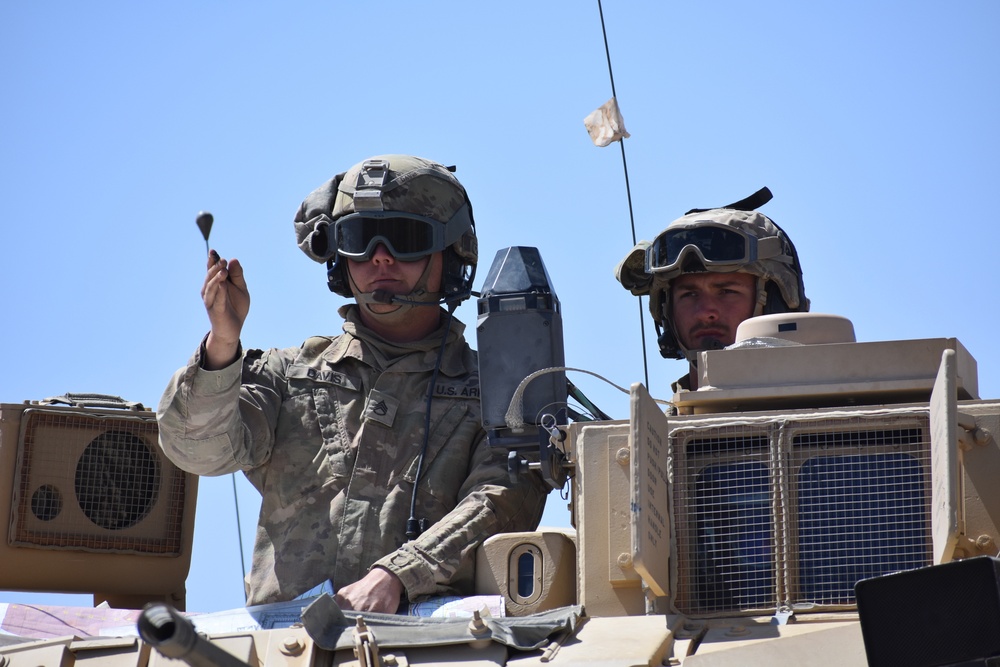 Regiment defends position with tanks, Bradleys