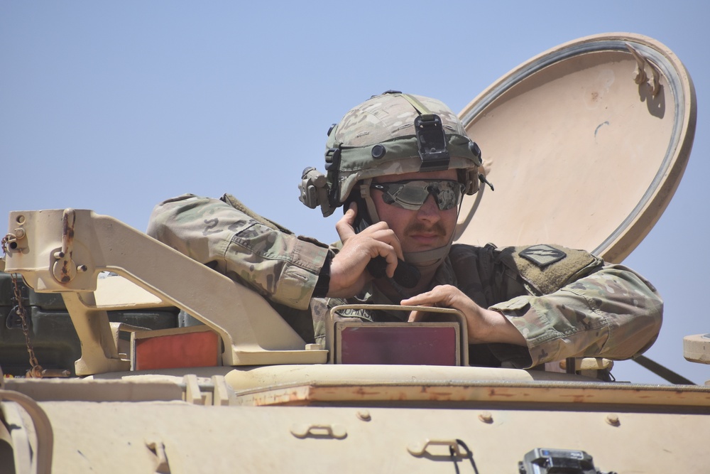Regiment defends position with tanks, Bradleys