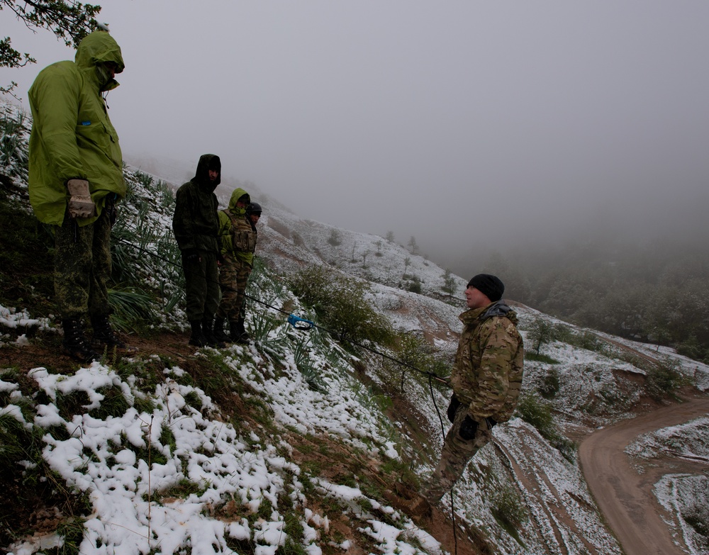 Tajik soldiers practice their mountaineering skills with U.S. partners