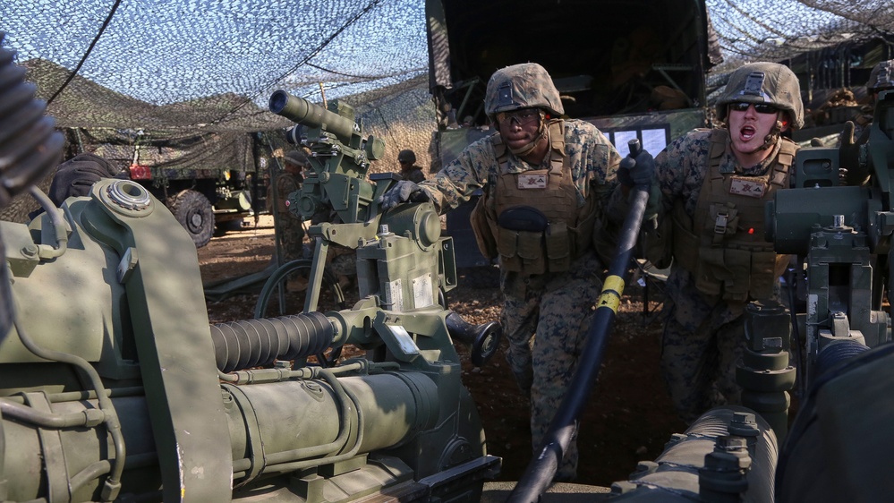 Bravo Battery Marines fire artillery rounds during Artillery Relocation Training Program 18-1