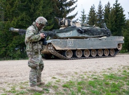 Soldiers shoot, freeze frame