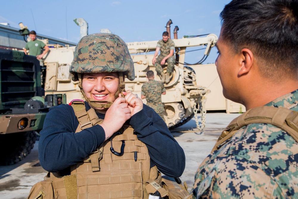 Family members learn what it's like to be a Marine or Sailor