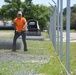 New Division Street Gate entrance construction fence goes up