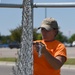 New Division Street Gate entrance construction fence goes up