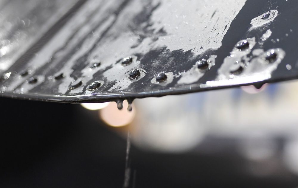 5th MXS Airmen wash the warbird