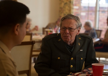 U.S. Marines and Sailors Pay Tribute To Previous Generations