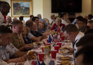 U.S. Marines and Sailors Pay Tribute To Previous Generations