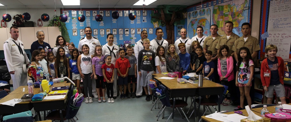 U.S. Marines And Sailors Go Back To School