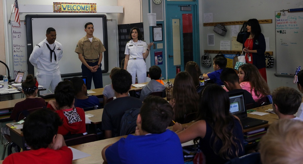 U.S. Marines And Sailors Go Back To School