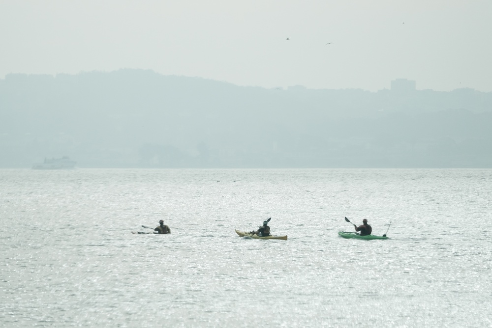 Kayakers heading out in the bay