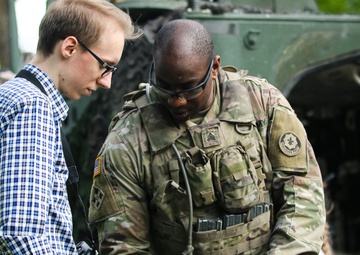 NATO Soldiers Help Celebrate Polish Flag Day
