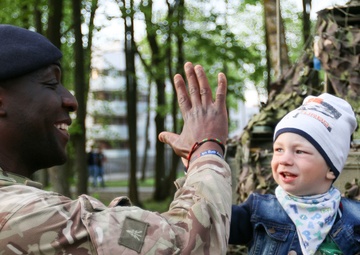 NATO Soldiers Help Celebrate Polish Flag Day