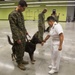 Rear Admiral Bolivar recognizes Military Working Dogs and Handlers