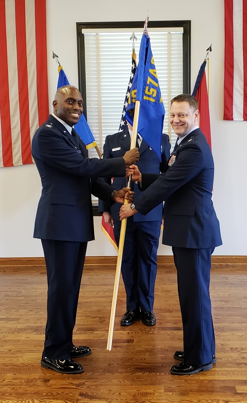 Lt. Col. Al Wirth accepts the 157th Air Intelligence Squadron Guidon