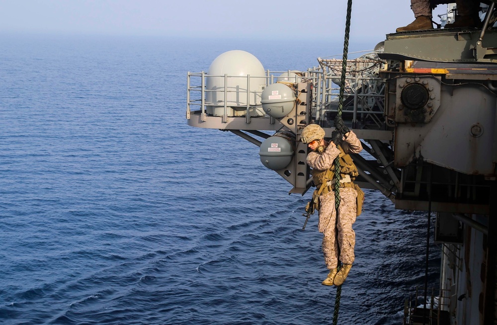 MEU Marines practice fast-roping aboard Iwo Jima