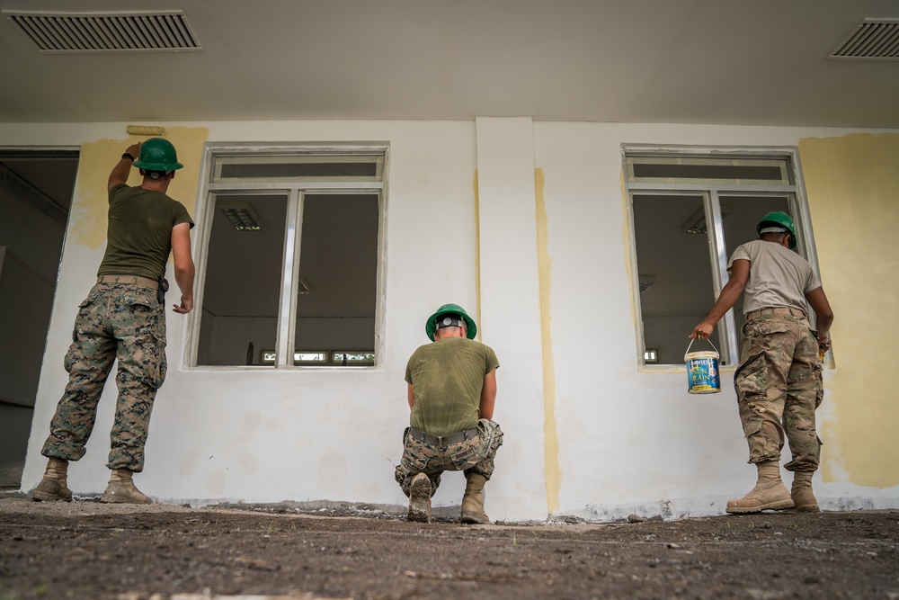Balikatan 18: Multinational forces paint school building at Calangitan ES