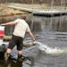 U.S. Fish and Wildlife Service personnel stock trout at Fort McCoy lakes