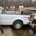 U.S. Fish and Wildlife Service personnel stock trout at Fort McCoy lakes