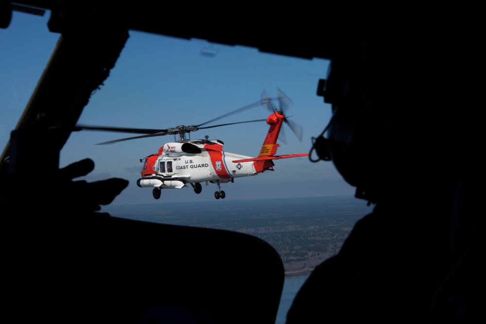 Coast Guard Air Station Cape Cod flies over Volvo Ocean Race Village in Newport, RI