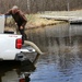 U.S. Fish and Wildlife Service personnel stock trout at Fort McCoy lakes