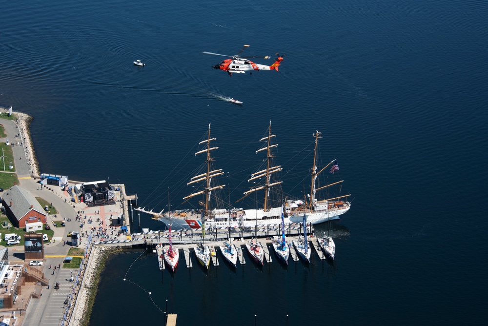 Coast Guard Air Station Cape Cod flies over Volvo Ocean Race Village in Newport, RI