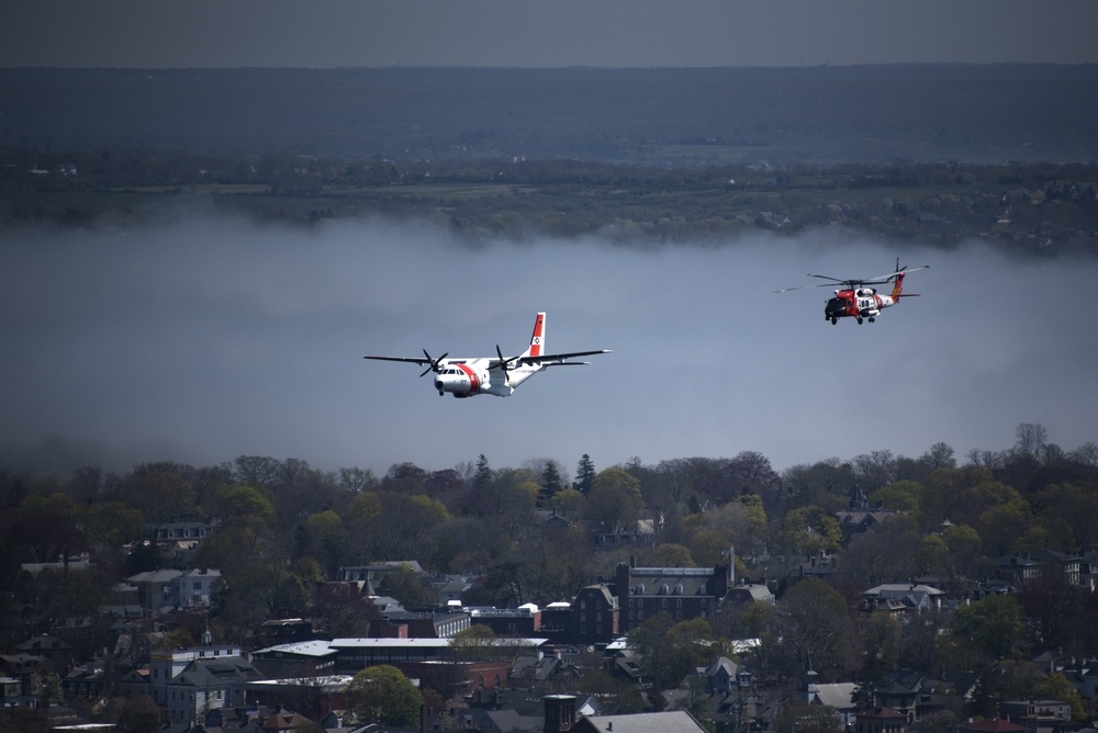 Coast Guard Air Station Cape Cod flies over Volvo Ocean Race Village in Newport, RI