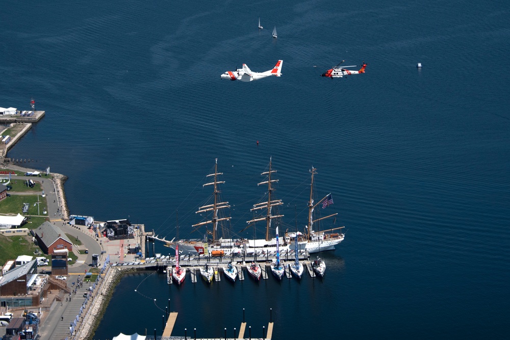 Coast Guard Air Station Cape Cod flies over Volvo Ocean Race Village in Newport, RI