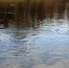 U.S. Fish and Wildlife Service personnel stock trout at Fort McCoy lakes