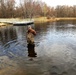 U.S. Fish and Wildlife Service personnel stock trout at Fort McCoy lakes