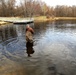 U.S. Fish and Wildlife Service personnel stock trout at Fort McCoy lakes