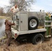 U.S. Fish and Wildlife Service personnel stock trout at Fort McCoy lakes