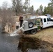 U.S. Fish and Wildlife Service personnel stock trout at Fort McCoy lakes