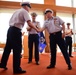 Atlantic Area Command Master Chiefs shake hands at a Change of the Watch ceremony