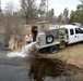 U.S. Fish and Wildlife Service personnel stock trout at Fort McCoy lakes