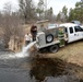 U.S. Fish and Wildlife Service personnel stock trout at Fort McCoy lakes