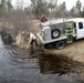 U.S. Fish and Wildlife Service personnel stock trout at Fort McCoy lakes