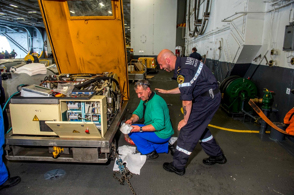 French Sailors Conduct Tractor Maintenance Aboard GHWB