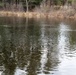 U.S. Fish and Wildlife Service personnel stock trout at Fort McCoy lakes