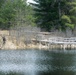 U.S. Fish and Wildlife Service personnel stock trout at Fort McCoy lakes