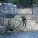 U.S. Fish and Wildlife Service personnel stock trout at Fort McCoy lakes