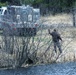 U.S. Fish and Wildlife Service personnel stock trout at Fort McCoy lakes