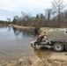 U.S. Fish and Wildlife Service personnel stock trout at Fort McCoy lakes