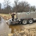 U.S. Fish and Wildlife Service personnel stock trout at Fort McCoy lakes